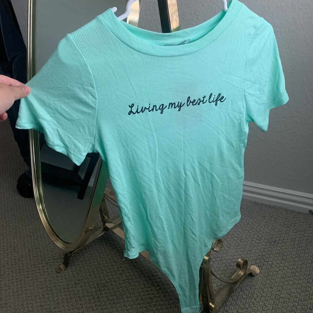 A mint bodysuit